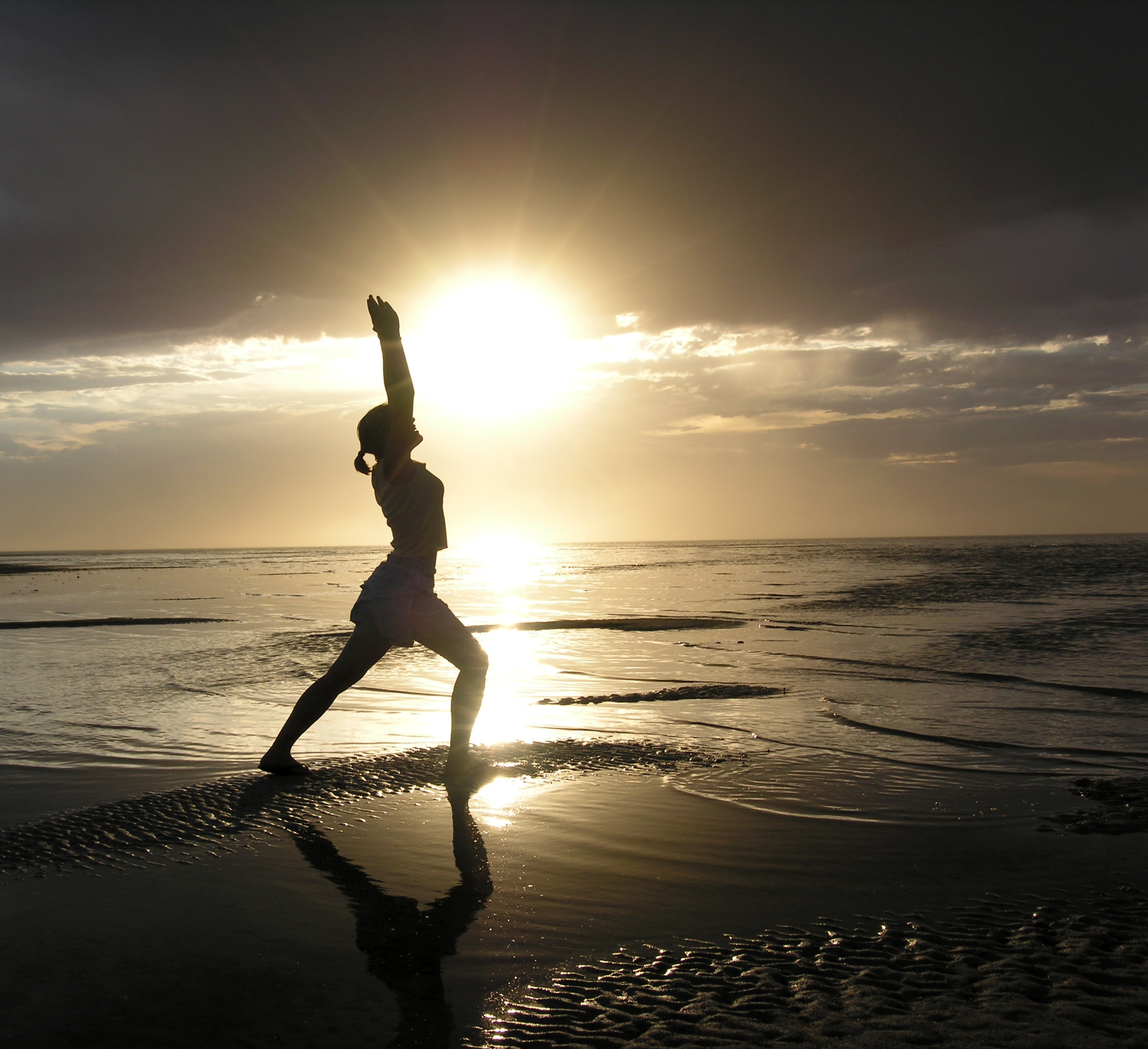 bigstockphoto_Yoga_On_The_Beach_154327.jpg